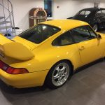 yellow porche carrera RS side