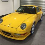 yellow porche carrera RS front